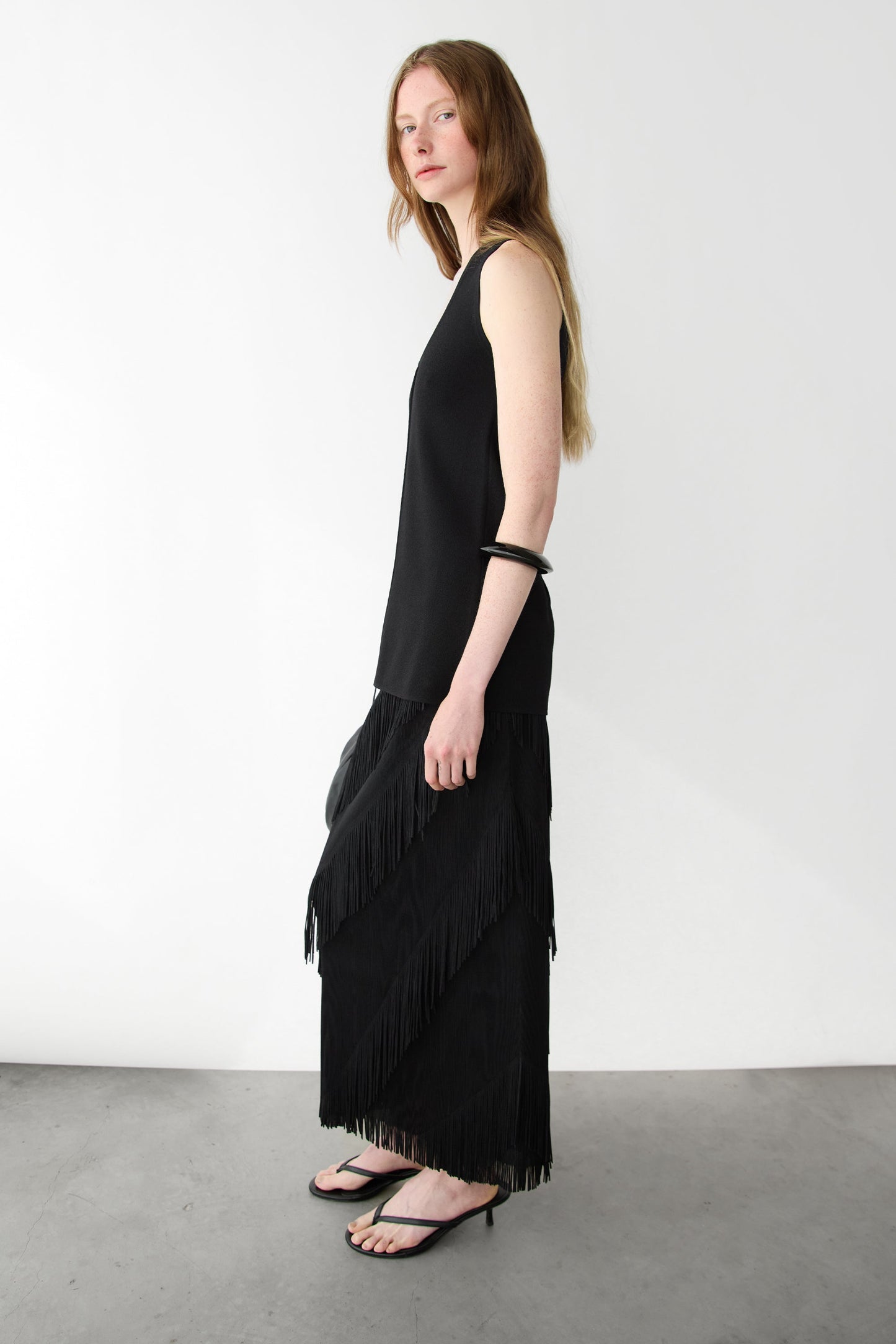 ASYMMETRICAL FRINGE SKIRT