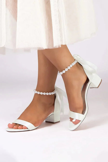 Block-Heel Sandal Adorned with Pearl Ankle Band and Ribbon Bow