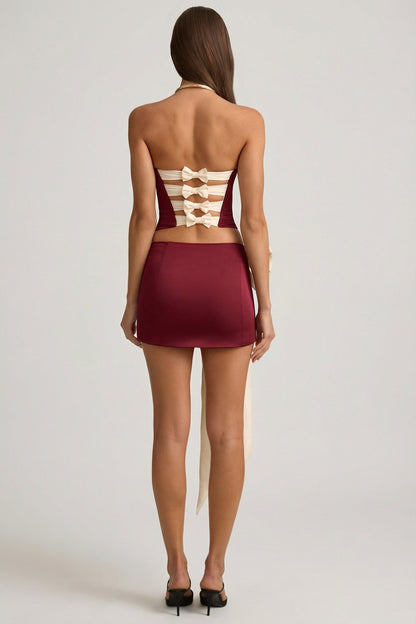 Satin Bow-Detail Low-Rise Mini Skirt in Wine Red